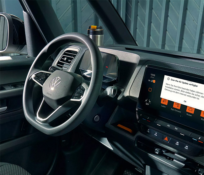 Steering wheel with an infotainment screen to the right of it