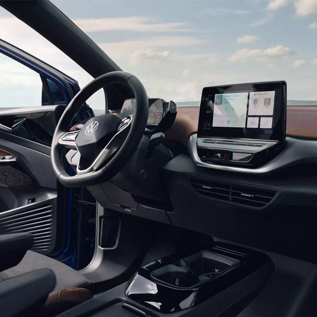 Interior of a left-hand drive SUV with the drivers door open