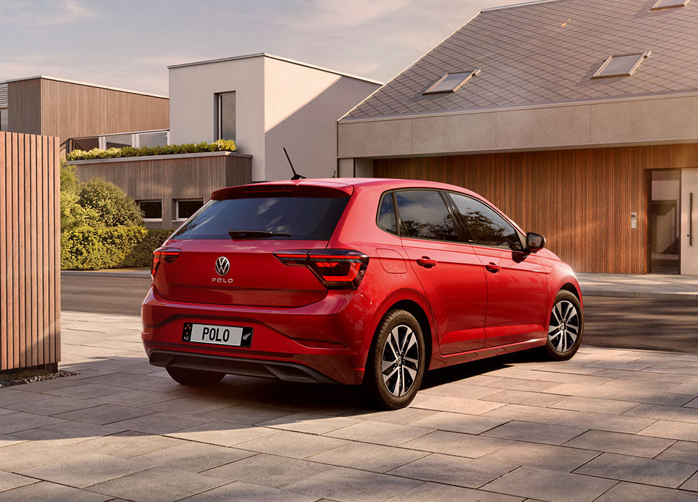 Rear 3/4 angle of a red VW Polo
