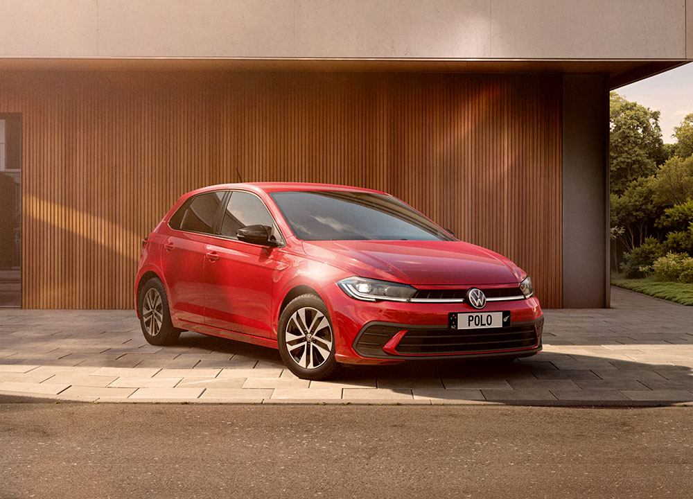 Front 3/4 angle of a red VW Polo