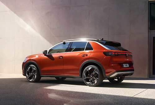 A red T-Roc parked in an urban space